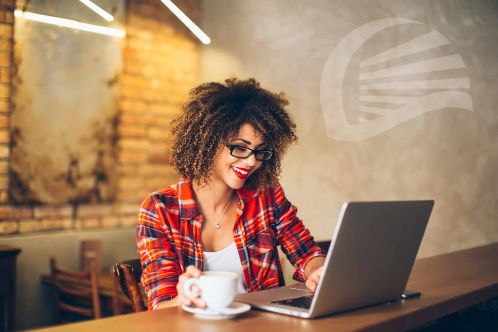 happy female checking laptop with coffee, NAUPA icon